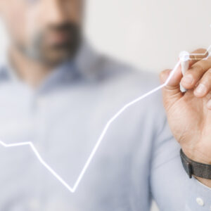 Man giving a business presentation using a futuristic digital pe